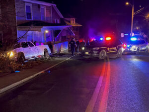 Car chase ends when truck crashes into porch
